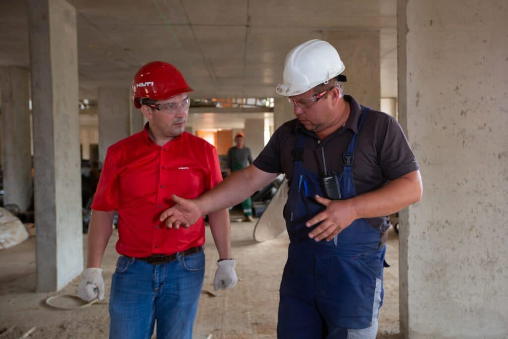 Construction Workers Inspecting Job Site