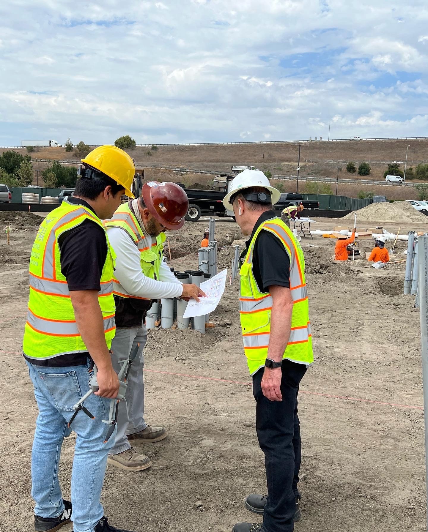 Construction Manager Meets with Drone Service Provider in the Field